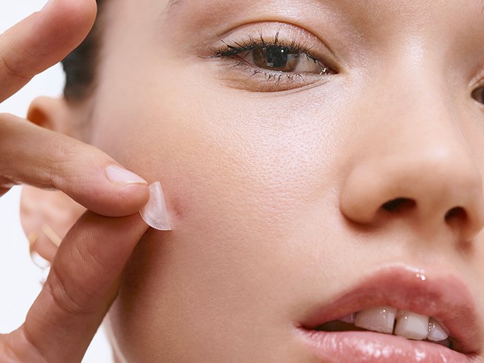 photo of person using pimple patch